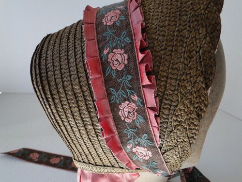 Detail of the floral ribbon and pleated silk trim.